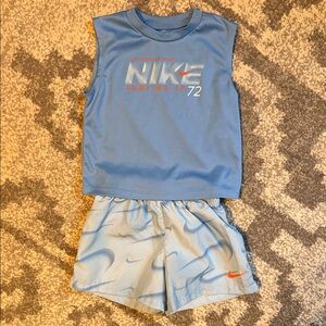 Nike Light Blue Sleeveless Top & Shorts Set with Orange Accent